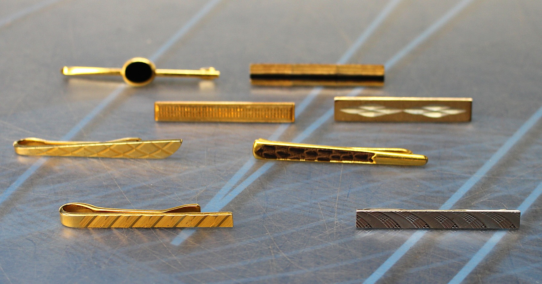 8 alfileres o pasadores de corbata. Años 50 – 70. Pisacorbatas.