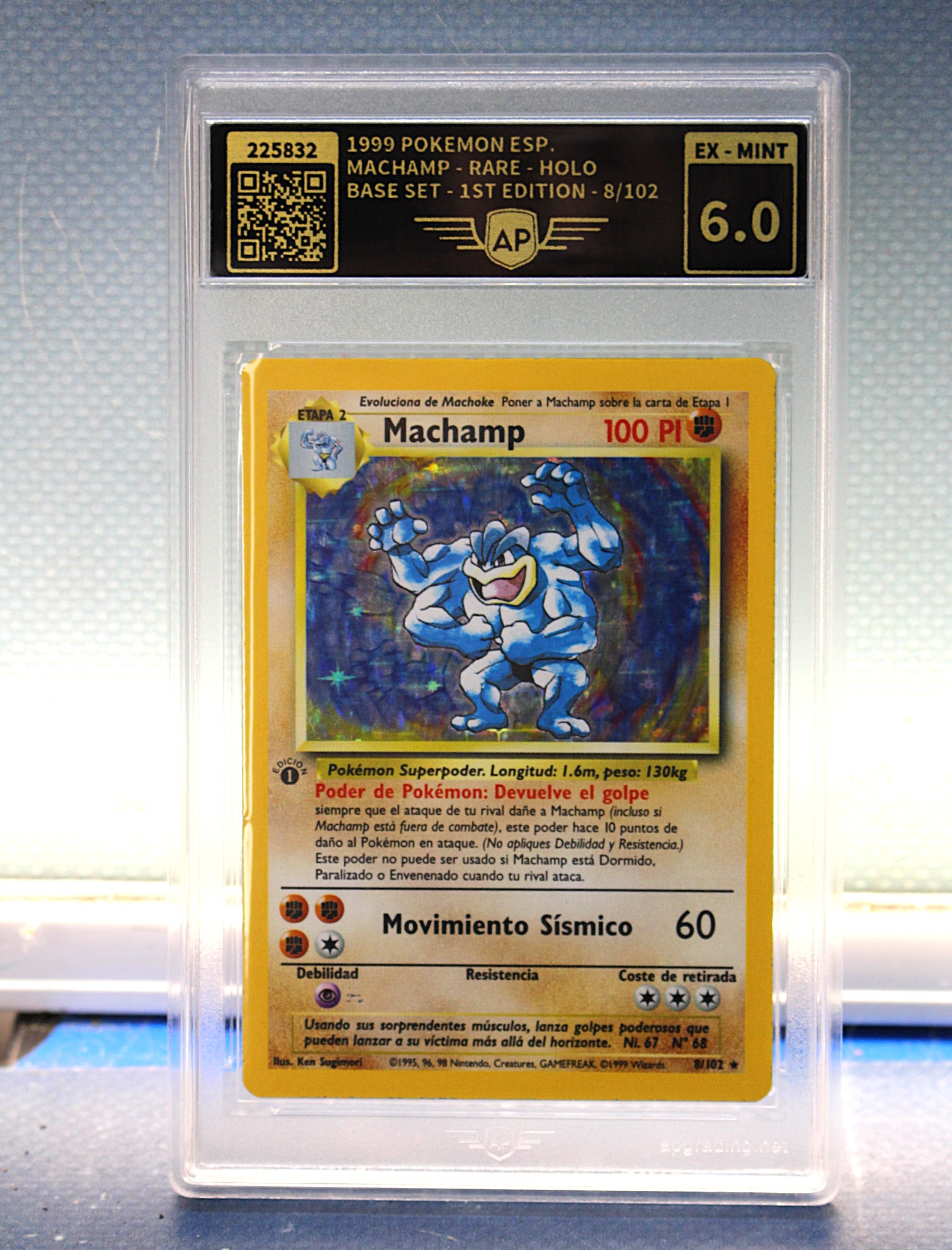 Carta Pokémon Machamp Holo Rare.  1ª Edición. Base Set 8/102. 1999, España. EX – Mint 6.0.